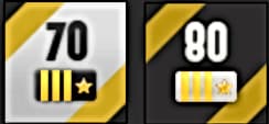 Comparison of newer white and previous black insignias